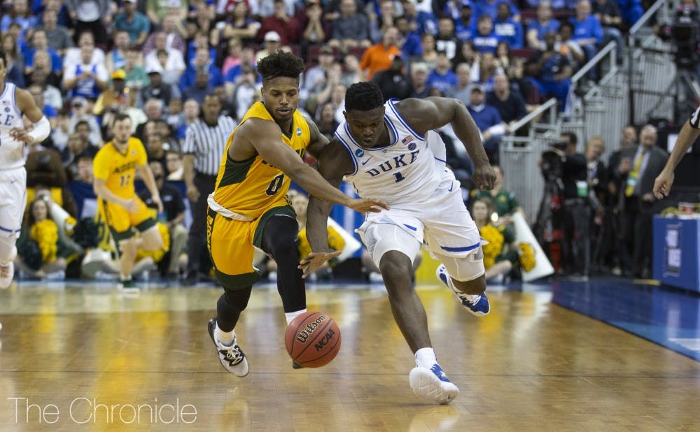 Zion Williamson broke Marvin Bagley III's freshman record for points in an NCAA tournament debut—and then R.J. Barrett passed his classmate a few minutes later.