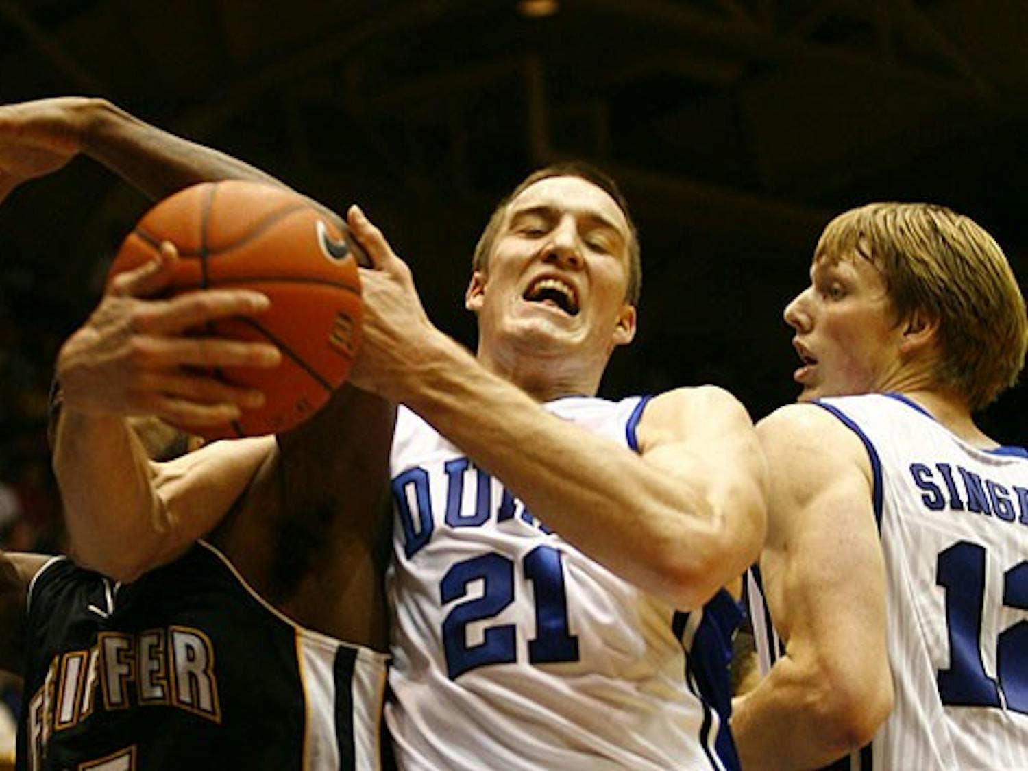 Miles Plumlee (21, center) and the Blue Devil front line faces an experienced Findlay squad that won the 2008-2009 Division II national title Tuesday at 7 p.m.