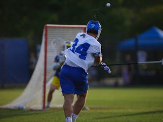 Junior attackman Brennan O'Neill releases a shot in Duke's opening-round win against Delaware.