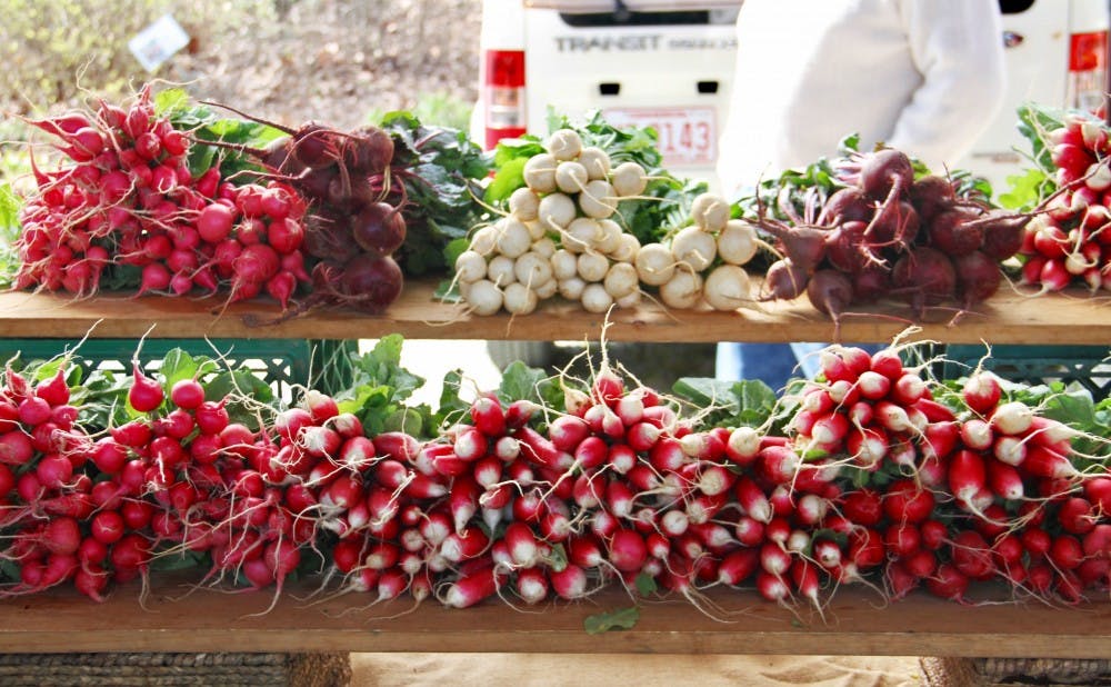 Red Hawk Farms' vibrant display of turnips, beets and other tubular root vegetables at last Saturday's Durham Farmers' Market.