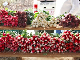 Red Hawk Farms' vibrant display of turnips, beets and other tubular root vegetables at last Saturday's Durham Farmers' Market.