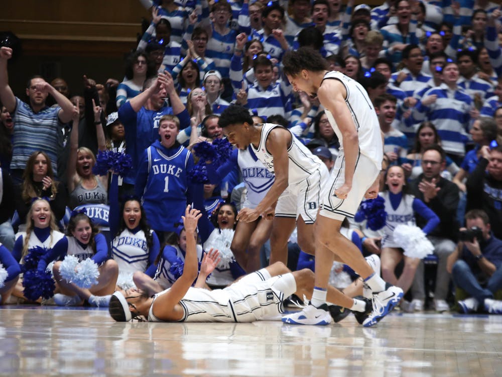 Dereck Lively II (right) had four blocks in the first half to help Duke keep a one-point lead going into the locker room.