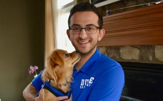 Junior Tony Dagher with his dog, Duke | Special to the Chronicle