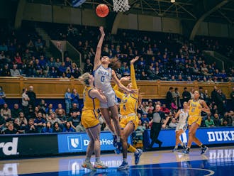 Duke senior Celeste Taylor (game-high 13 points) goes up for the layup against Pittsburgh.