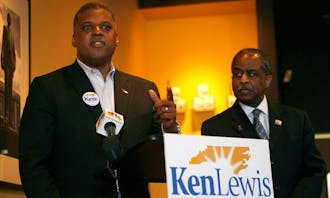 Kenneth Lewis, Trinity ‘83, accepts an endorsement from Durham Mayor Bill Bell for the Democratic Party’s U.S. Senate nomination. Bell announced his support for Lewis, a Durham attorney, at Beyu Caffe Monday.