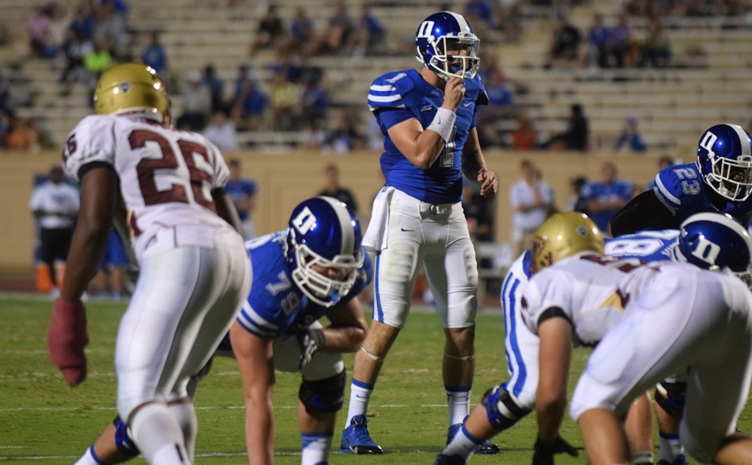 Redshirt sophomore quarterback Thomas Sirk accumulated 58 rushing yards and a pair of touchdown rushes in relief of starter Anthony Boone in Duke's route of the Phoenix.