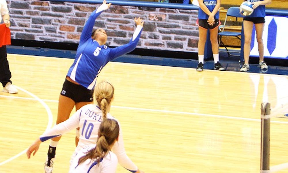 Ali McCurdy added to her ACC-leading dig total over the weekend against Virginia and Virginia Tech.