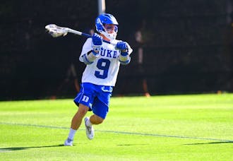 Case Matheis scored three goals, including Duke's last two scores, to send the Blue Devils to its seventh consecutive NCAA quarterfinal.
