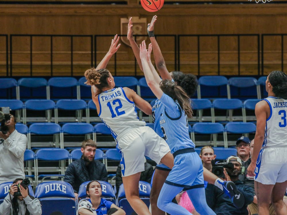 Delaney Thomas goes up for the finish against Columbia. 