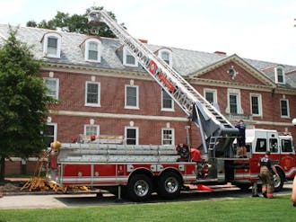 Three fire trucks arrived after DUPD received reports of flames coming from the roof of Giles dormitory.