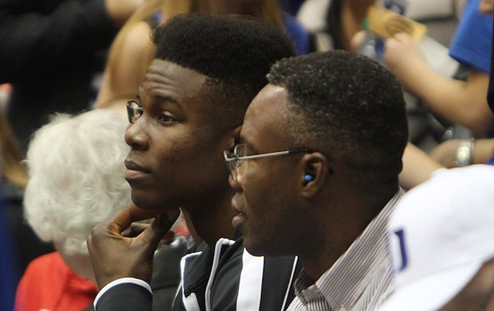 Semi Ojeleye sits at the Duke-Georgia State game on his official visit to Duke earlier in the season.