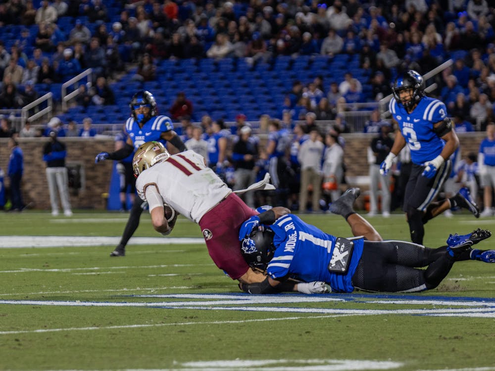 Junior safety Terry Moore gets after the quarterback in the backfield.