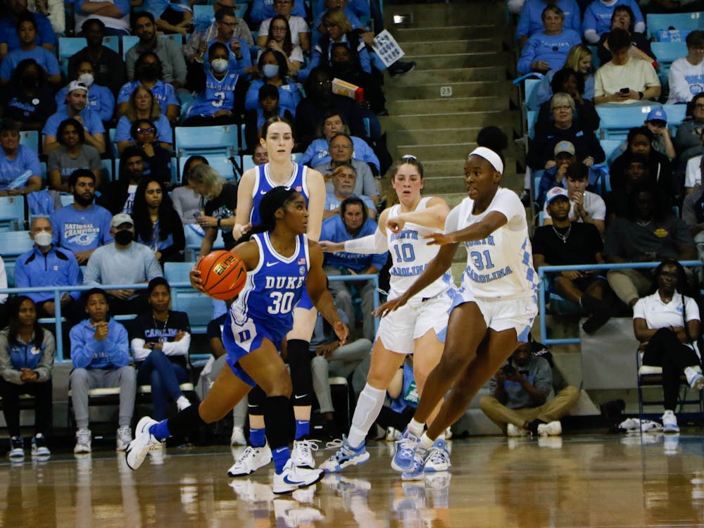 <p>Shayeann Day-Wilson (game-high 24 points) drives during the first half of Duke's loss at North Carolina.</p>