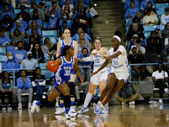 Shayeann Day-Wilson (game-high 24 points) drives during the first half of Duke's loss at North Carolina.