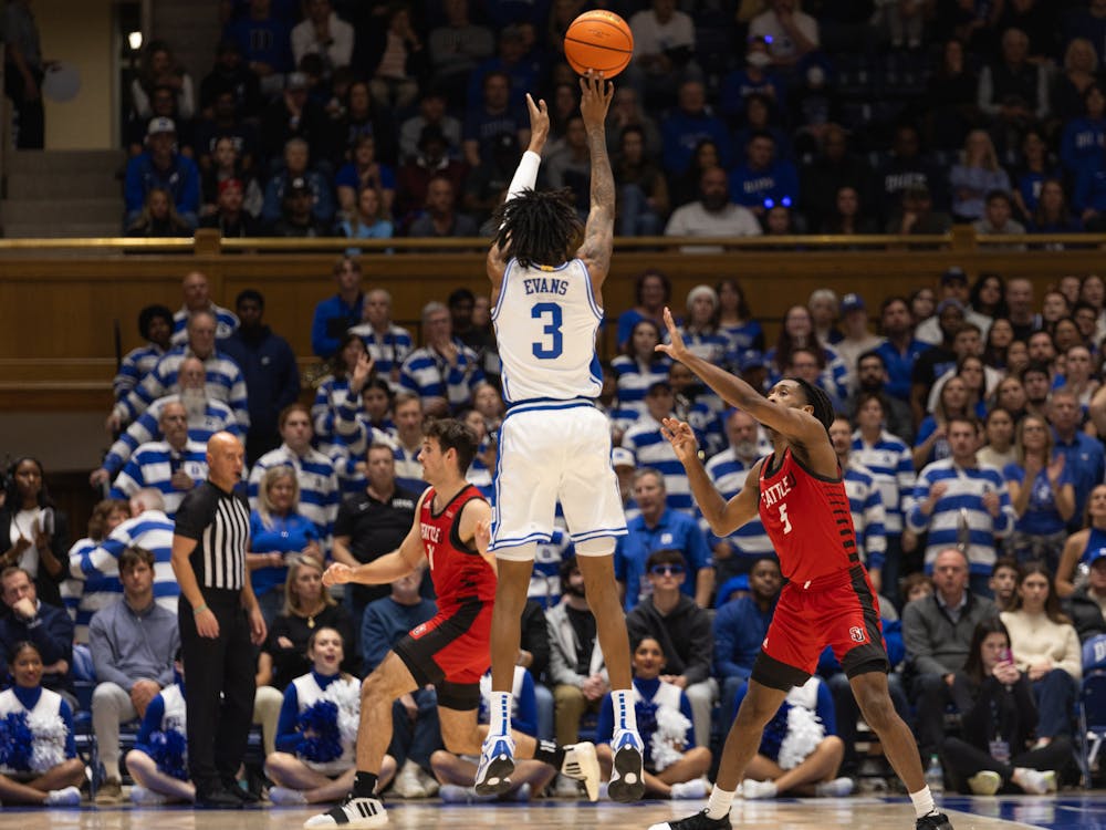 Freshman guard Isaiah Evans lines up a triple against Seattle. 