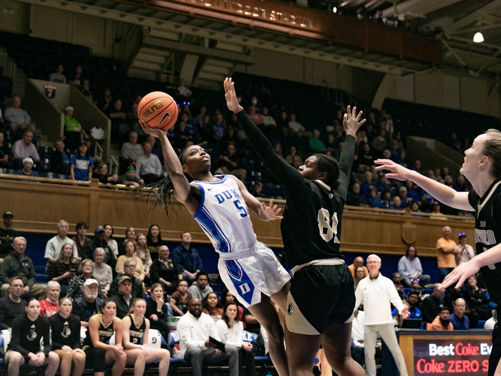 Oluchi Okananwa goes up for a finish against Wofford. 