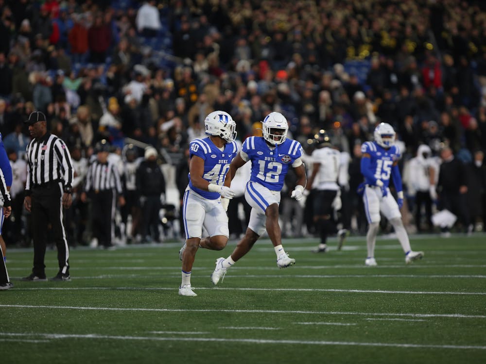 Ryan Smith (40) and Tre Freeman (12) collected a sack apiece in the win. Duke sacked UCF quarterback John Rhys Plumlee six times, a new Military Bowl record.
