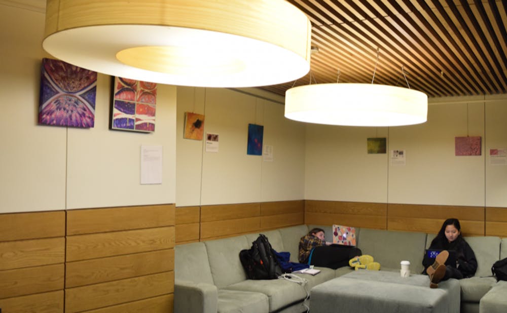 Students study in the lounge adjacent to Au Bon Pain in the Brodhead Center, which houses the "Art of Science" exhibit space.