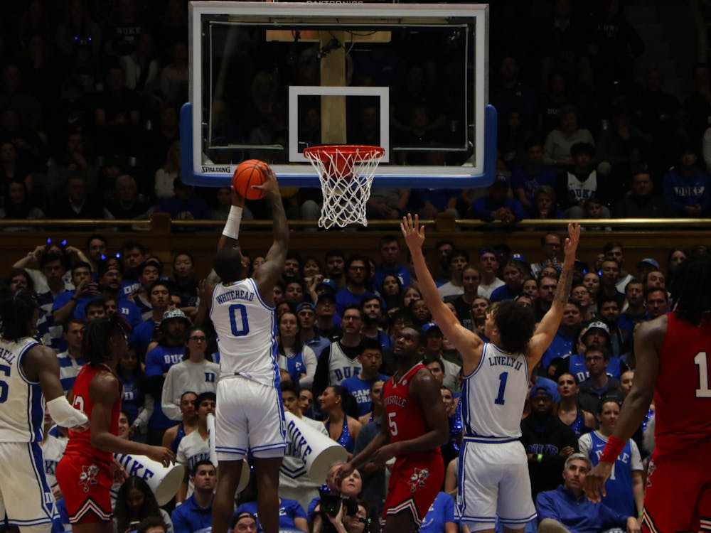 Dariq Whitehead leaps up to the bucket against Louisville.