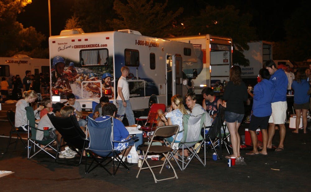 Students in Duke's graduate and professional schools camp out in designated areas of the Blue Zone parking lot to await season tickets for men's basketball.