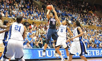 Connecticut forward Maya Moore scored a quiet 20 points, most of them from the perimeter, to help kill any Duke hopes Monday.