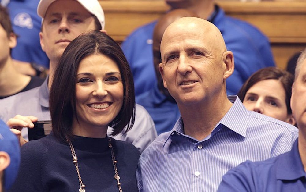 Daina Falk and her father, basketball agent David Falk, at this year’s Duke-North Carolina basketball game.