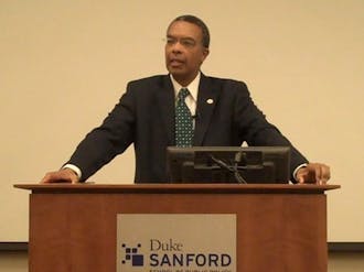 Aaron Williams, director of Peace Corps, speaks in the Sanford School of Public Policy Thursday afternoon. Williams urged students to join the volunteer organization, touting it as “the humanitarian face of America.”
