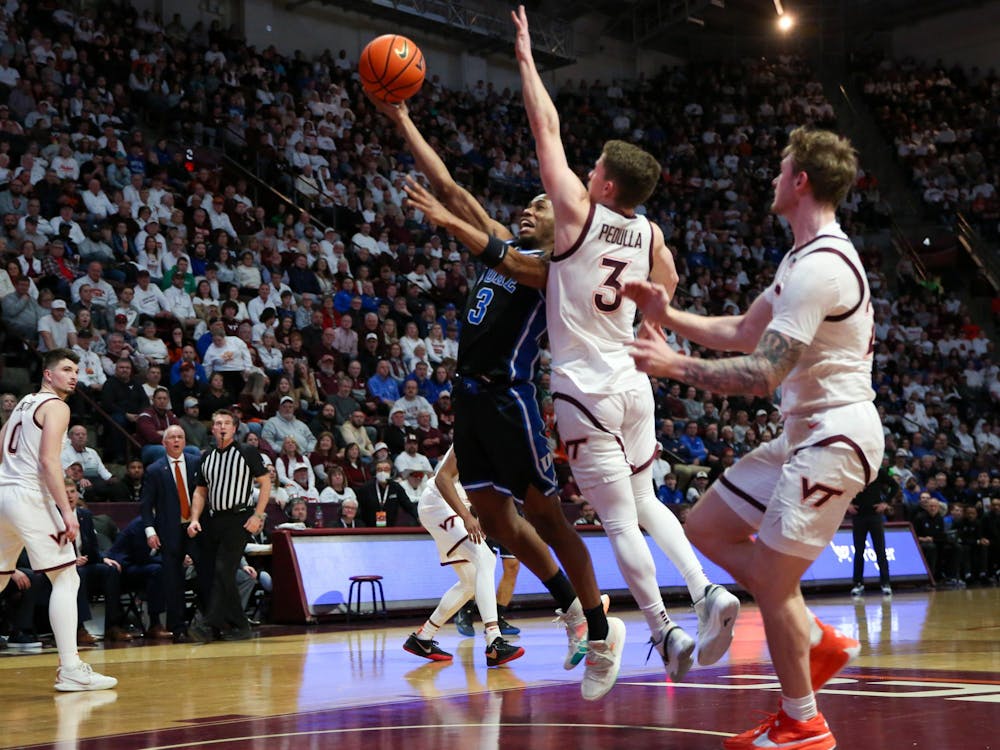 Jeremy Roach fights for a layup during Duke's Monday road win against Virginia Tech.