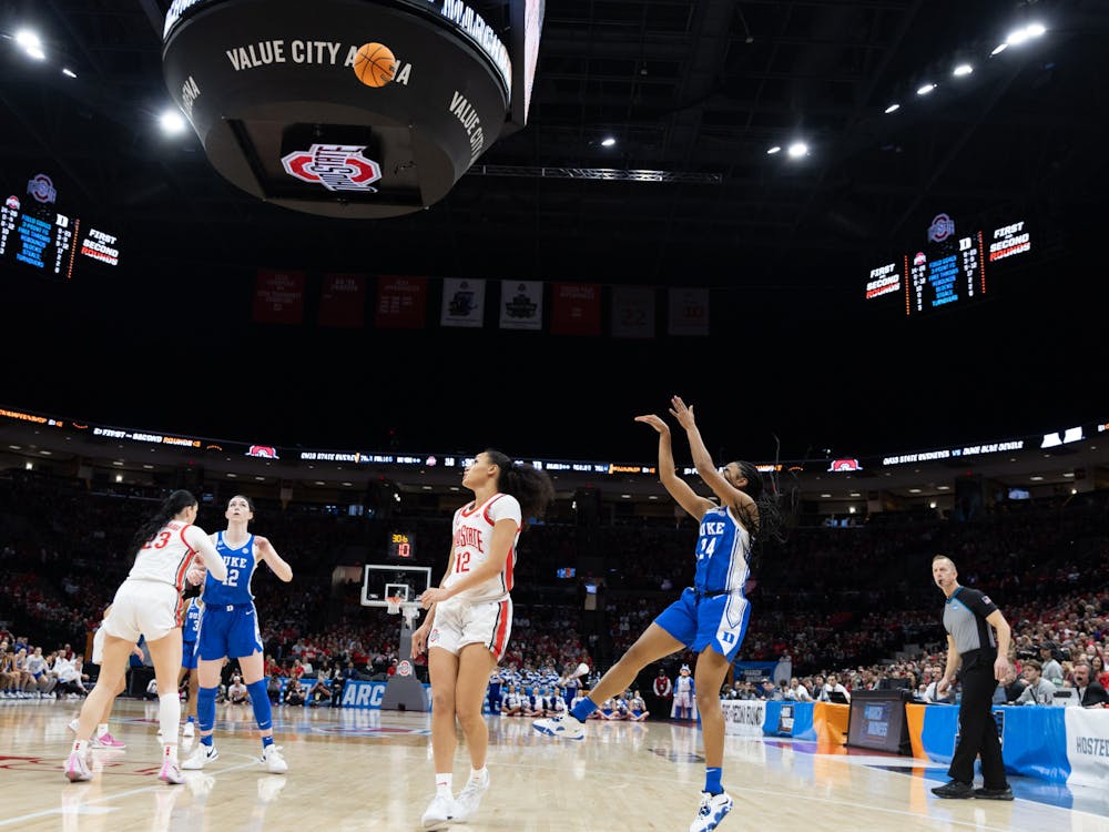 Reigan Richardson sails the ball over Ohio State guard Celeste Taylor during Duke's second-round win.