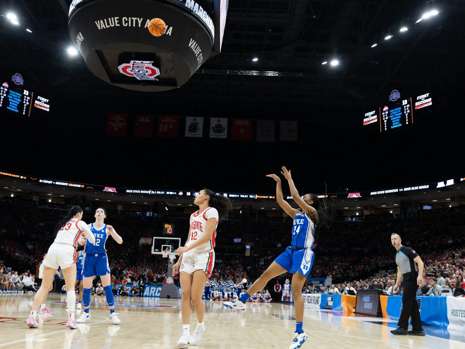 Reigan Richardson sails the ball over Ohio State guard Celeste Taylor during Duke's second-round win.