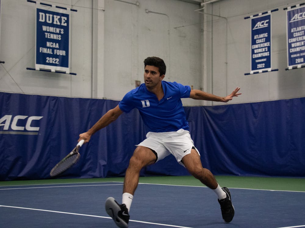 Faris Khan hits an approach shot during Duke's January matchup with N.C. Central.