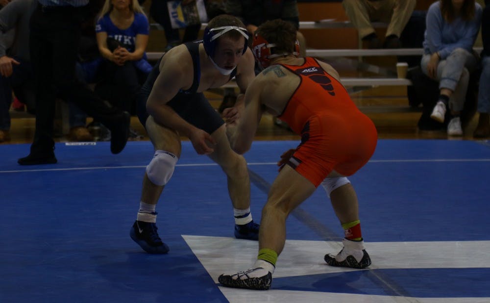 <p>Thayer Atkins recorded the first pin of his career Sunday at No. 23 Purdue, getting the Blue Devils off to a quick 6-0 start.</p>