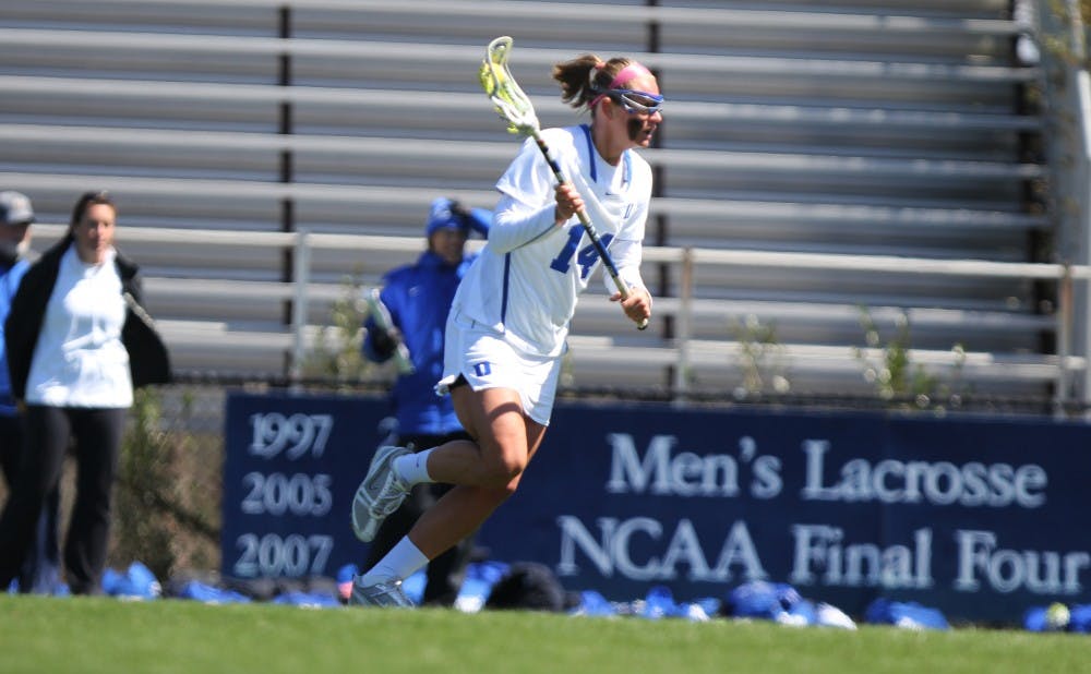 Taylor Trimble's pair of goals were not enough for the Blue Devils against sixth-seeded Syracuse Friday.