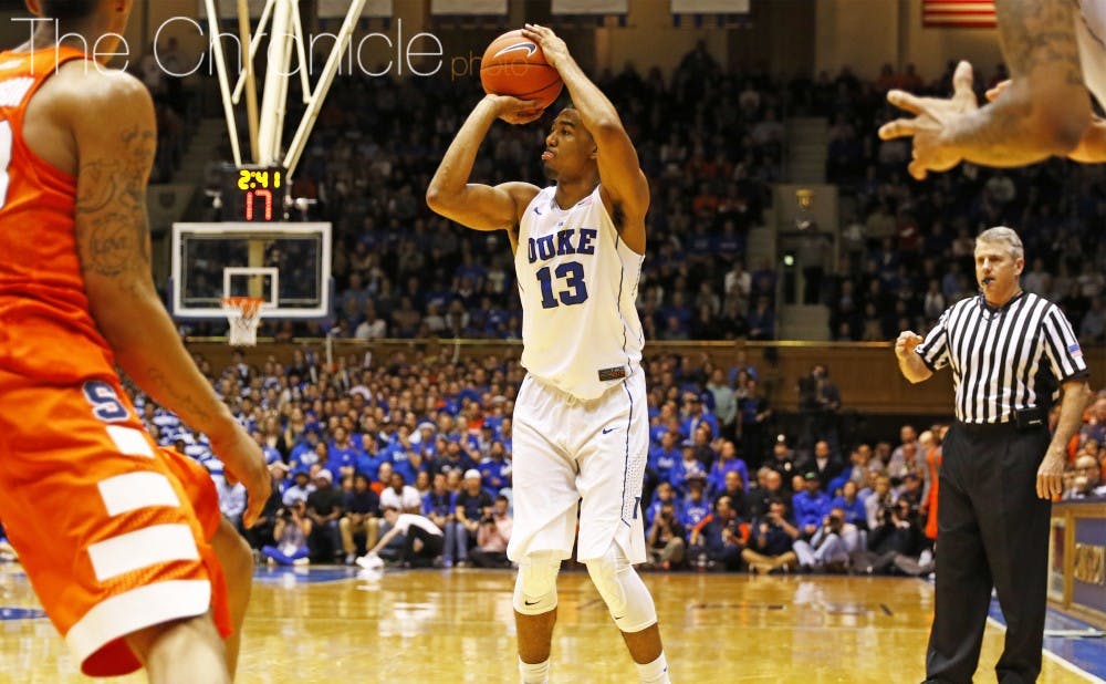 Duke let it fly from behind the arc against Syracuse's 2-3 zone, but connected on just 10 of its 37 3-point attempts.