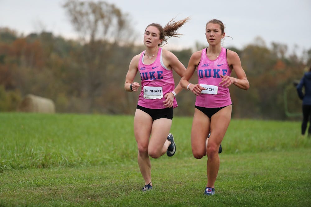 Seniors Michaela Reinhart (left) and Amanda Beach (right) have paced the Blue Devil women in each of the two races they've competed in this season.