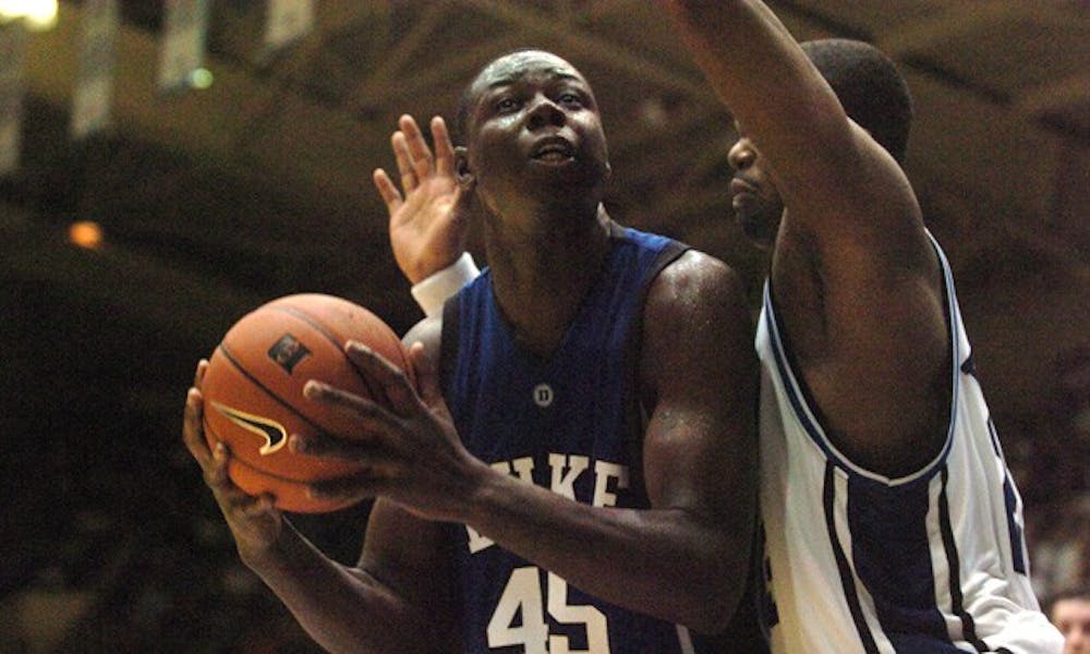 Sun Devils’ forward Eric Boateng (pictured above in the 2005 Blue-White scrimmage) played briefly in 20 games at Duke before transferring to Arizona State in 2006.