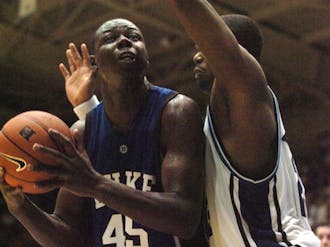 Sun Devils’ forward Eric Boateng (pictured above in the 2005 Blue-White scrimmage) played briefly in 20 games at Duke before transferring to Arizona State in 2006.
