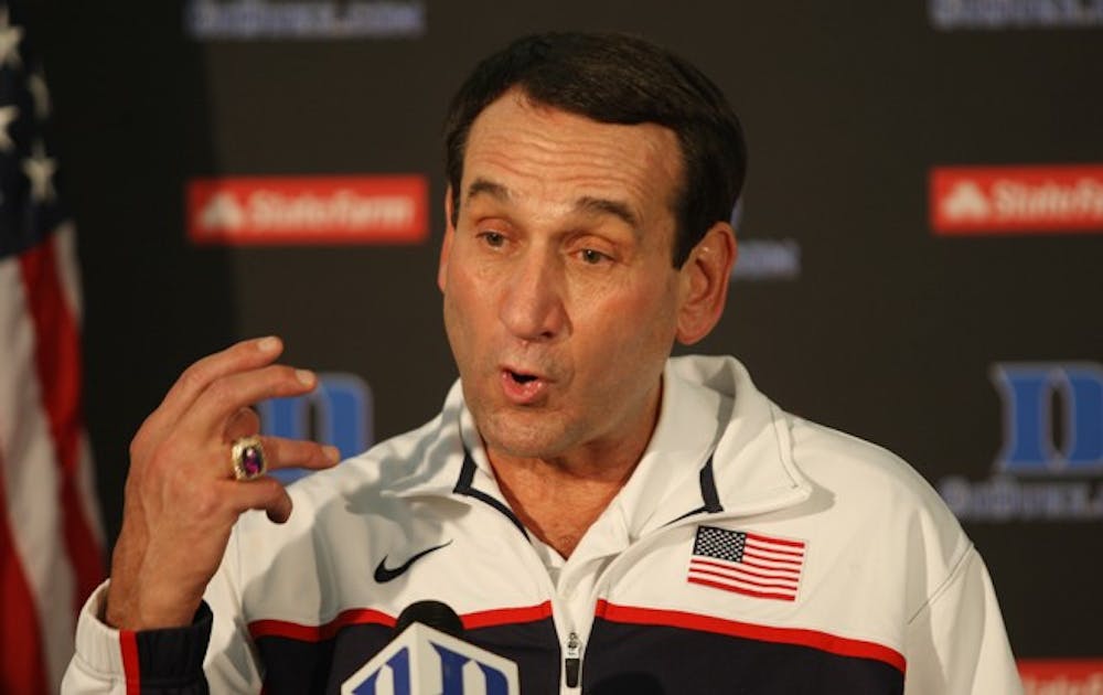Duke basketball coach Mike Krzyzewski spoke to the media at Raleigh-Durham International Airport after returning from London.