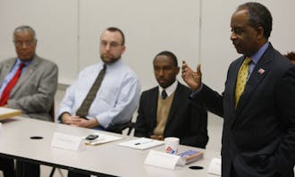 Durham Mayor Bill Bell speaks at an on-campus forum Monday night in front of an audience of about 30 people. The event brought city council candidates to Duke to debate issues surrounding the city.