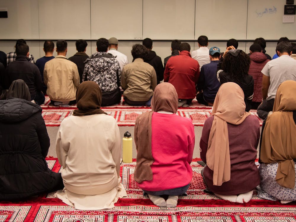 <p>Muslim students and community members pray the Maghrib prayer at sunset.</p>