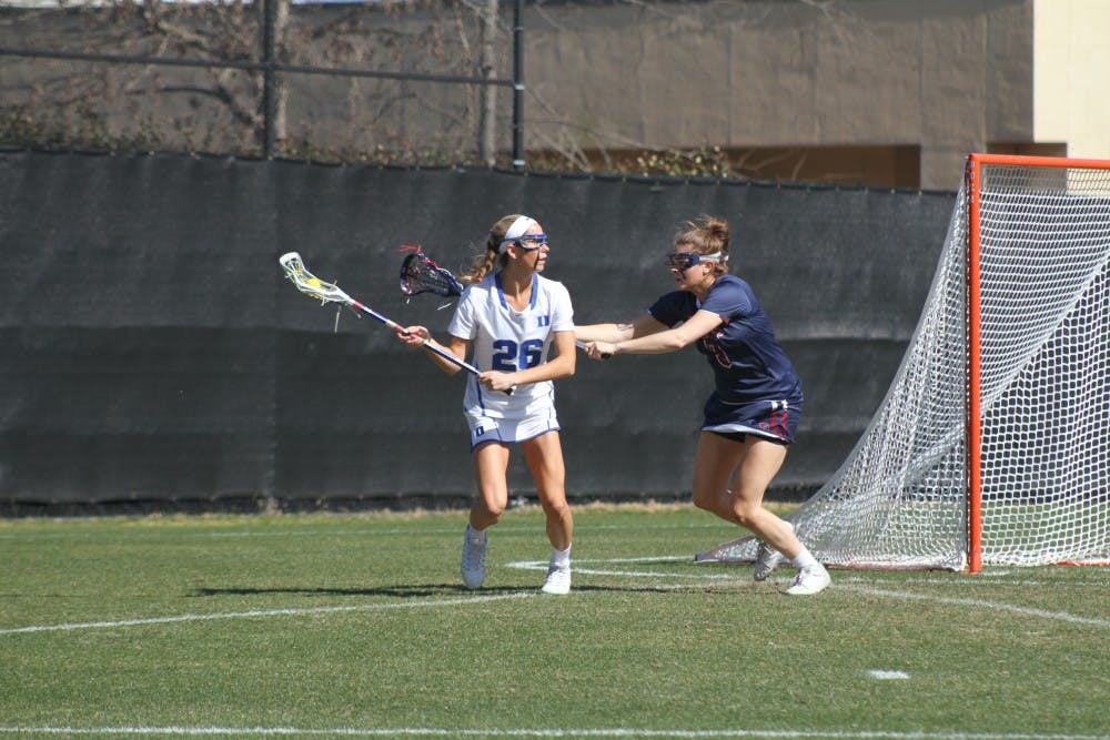 <p>Kelci Smesko scored six goals Saturday as the Blue Devils routed Louisville 16-5, bouncing back from Wednesday's loss to Georgetown.</p>