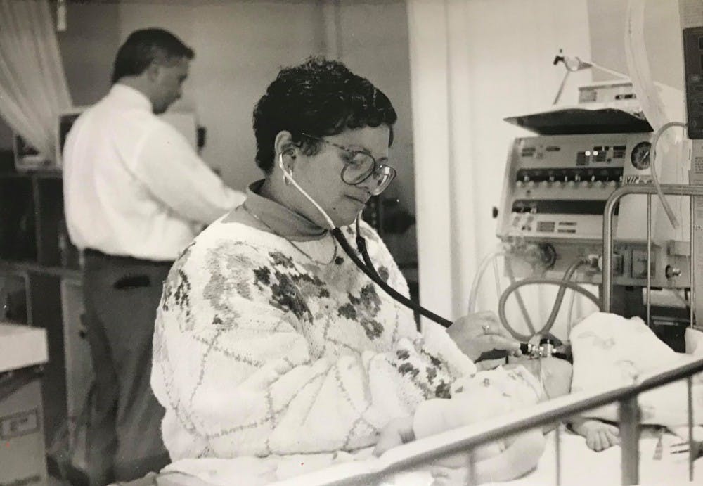 Dr. Brenda Armstrong examining a patient. Oct. 21, 1992 | Photo by Jason Laughlin