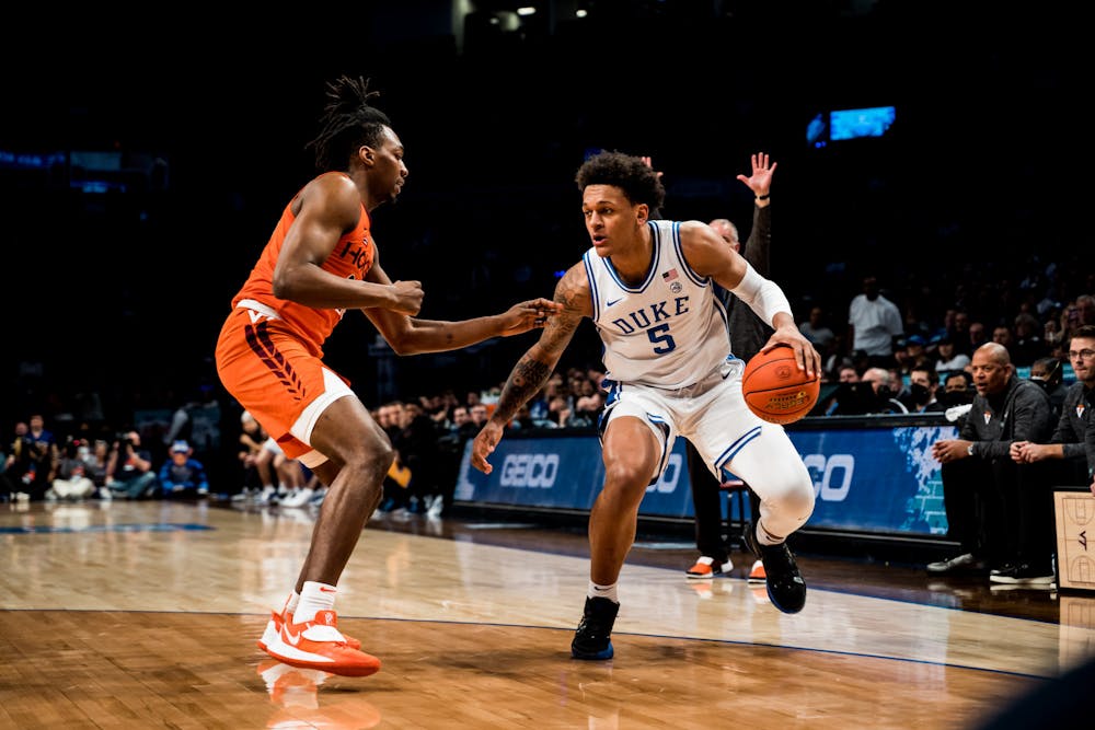 Paolo Banchero paced Duke with 10 points in the first half of Saturday's ACC tournament title game against Virginia Tech.