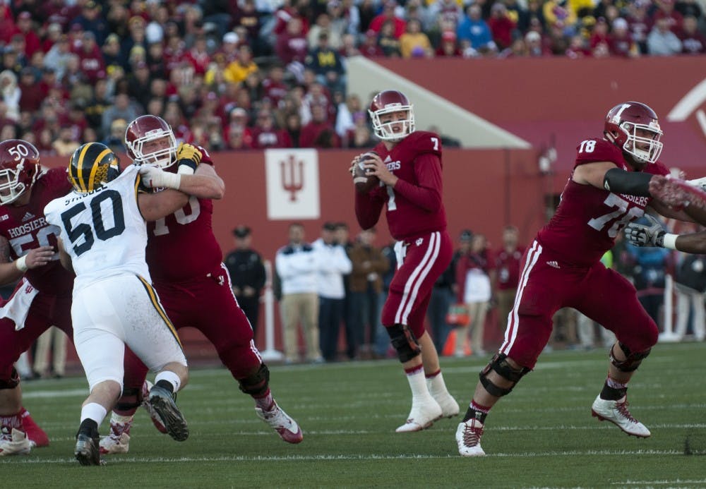 Quarterback Nate Sudfeld looks to pass during the against Michigan on Saturday at Memorial Stadium. The Hoosiers lost in double overtime, 41-48.