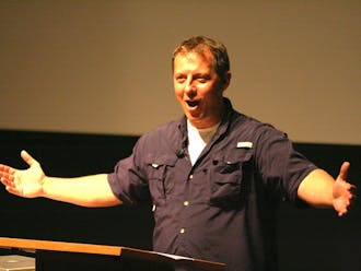 Martin Kratt, Trinity ’89, speaks about primate conservation in Griffith Film Theater Monday evening.
