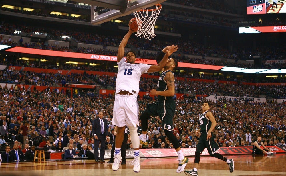 Jahlil Okafor had 18 points and six rebounds to lead the Blue Devils past Michigan State and into Monday's national title game.