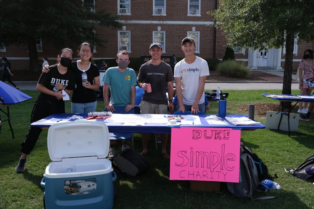 Members of Simple Charity at a tabling event. Courtesy of Andrew Lee.