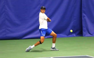 Freshman Nicolas Alvarez will play in both the NCAA singles and doubles tournaments Thursday after Wednesday's first-round singles victory.
