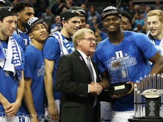 ACC Commissioner John Swofford awarding the MVP of the 2019 ACC tournament to Zion Williamson.