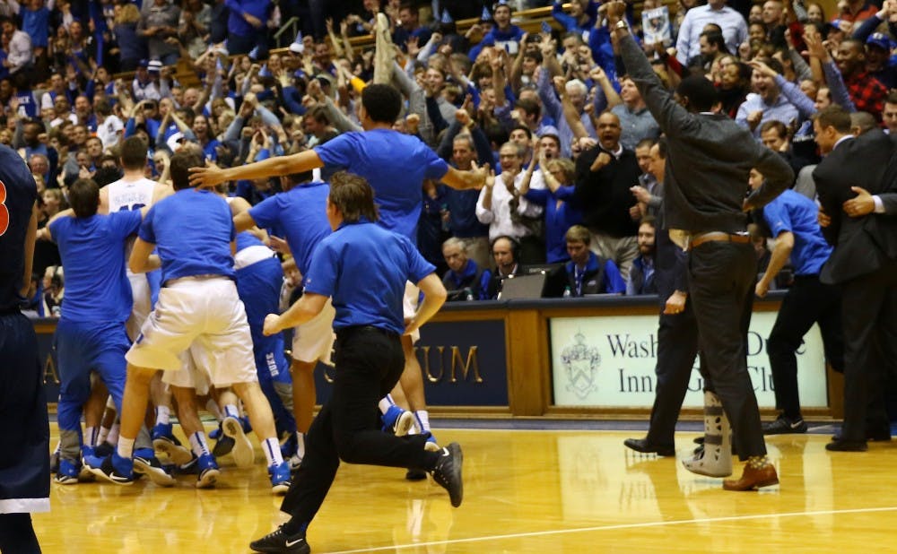 The team piled on Allen after his buzzer-beating shot was confirmed by replay to give the Blue Devils their second straight win against a ranked foe.